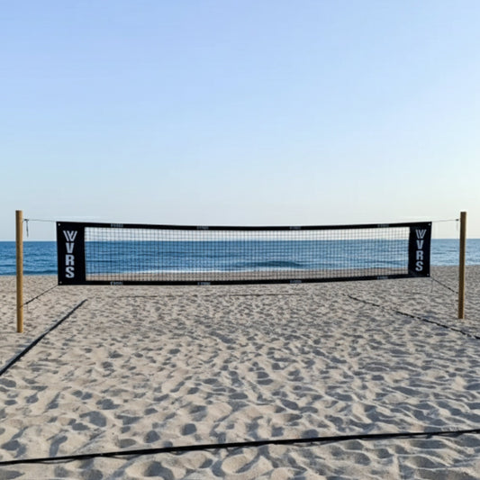 Red tenis playa Pro VRS 8,6 x 0,8 m instalada en arena con mar de fondo
