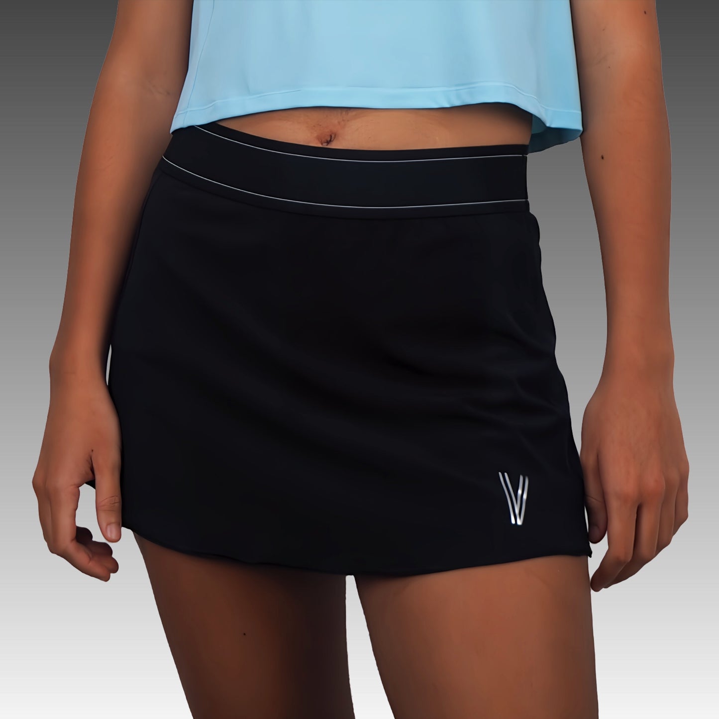 Falda deportiva mujer VIRUS Beach Tennis color negro frontal